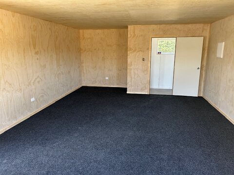 The lined interior looking towards the personnel door